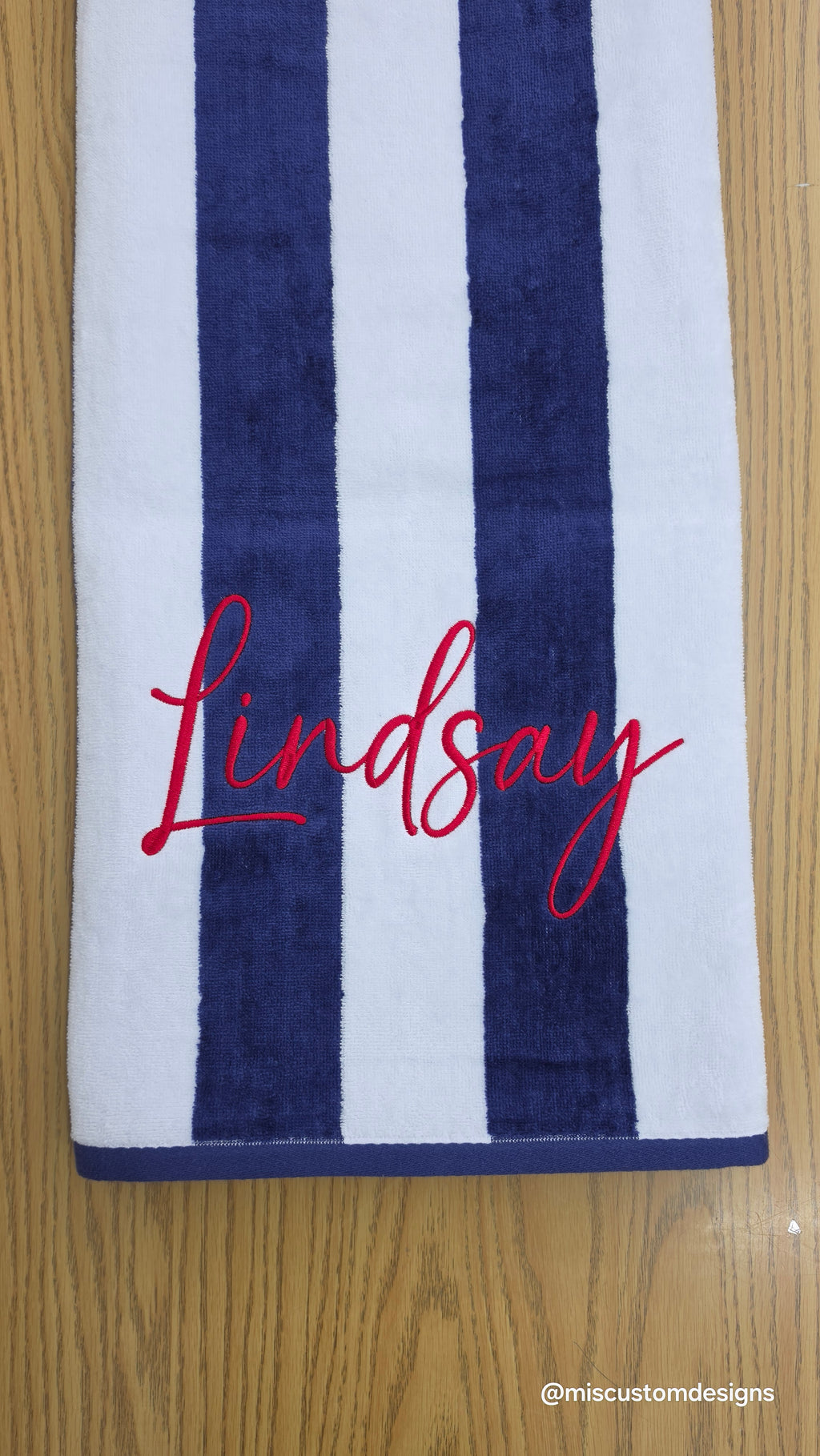 Custom beach towel with embroidered name