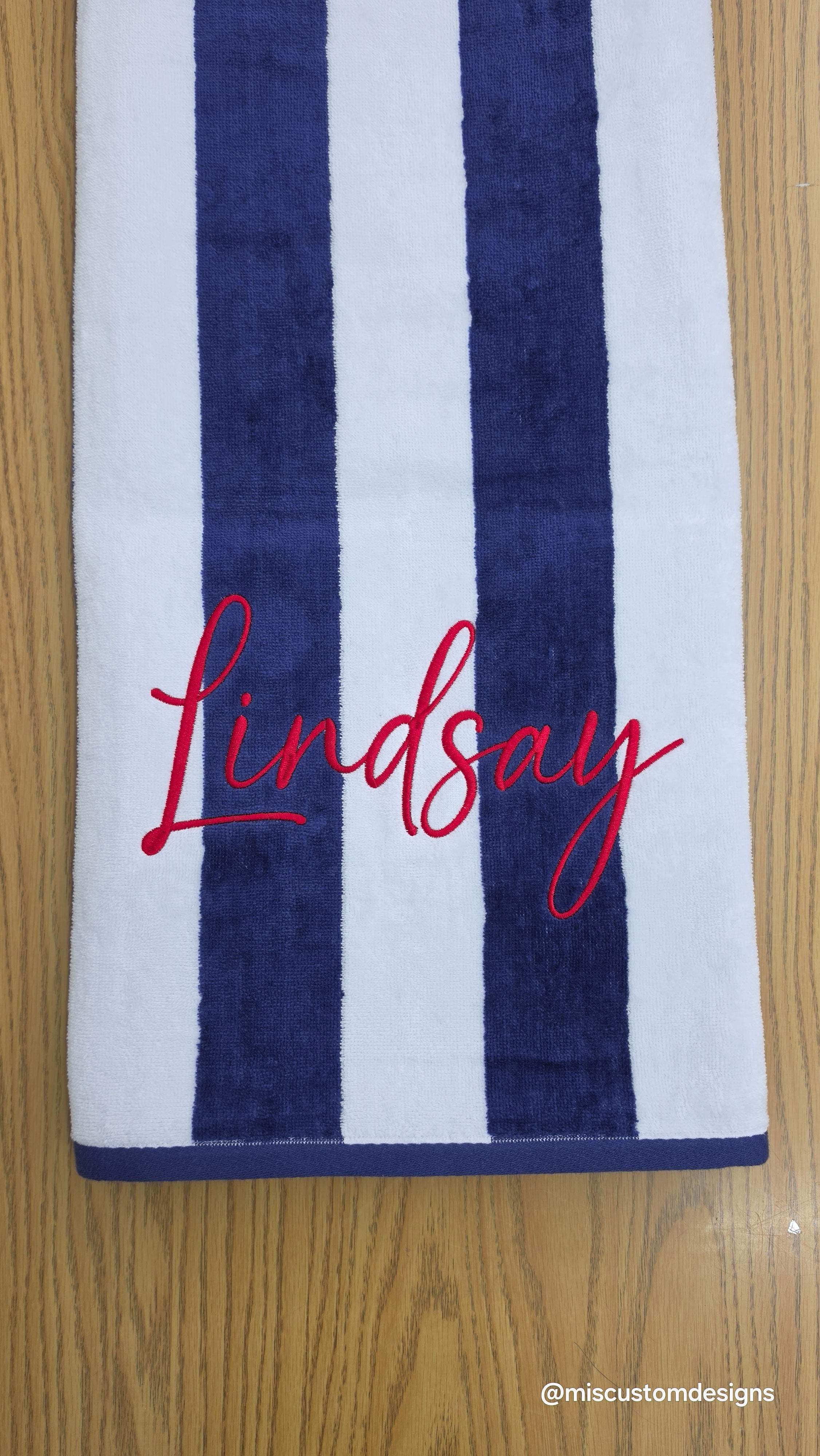Custom beach towel with embroidered name