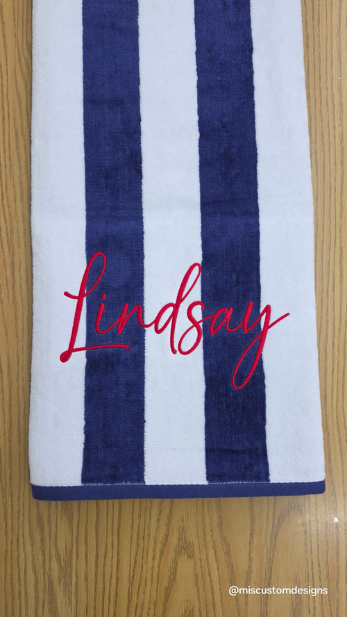 Custom beach towel with embroidered name
